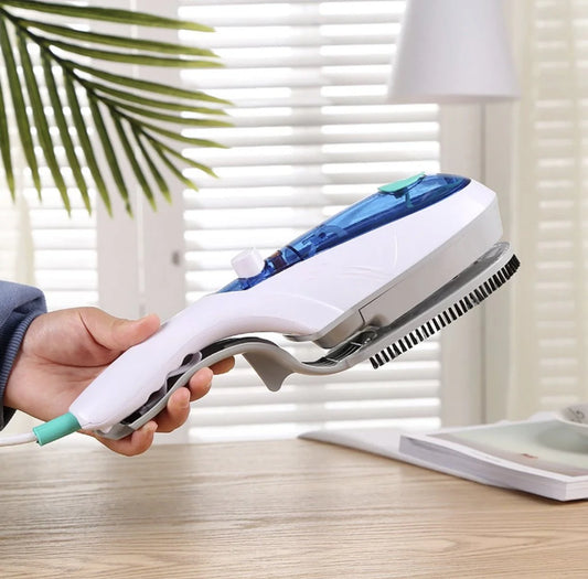 Plancha a Vapor Tobi Portátil color blanco 110V