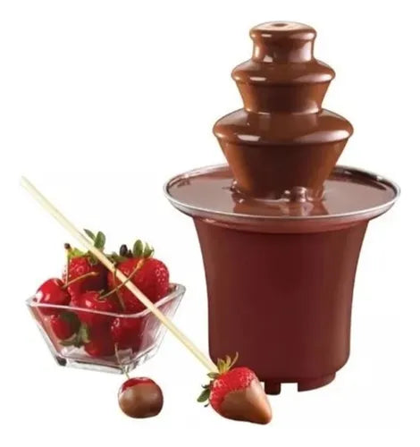 https://cdn.shopify.com/s/files/1/0953/9790/4752/files/fuente_de_chocolate.webp?v=1747929233
